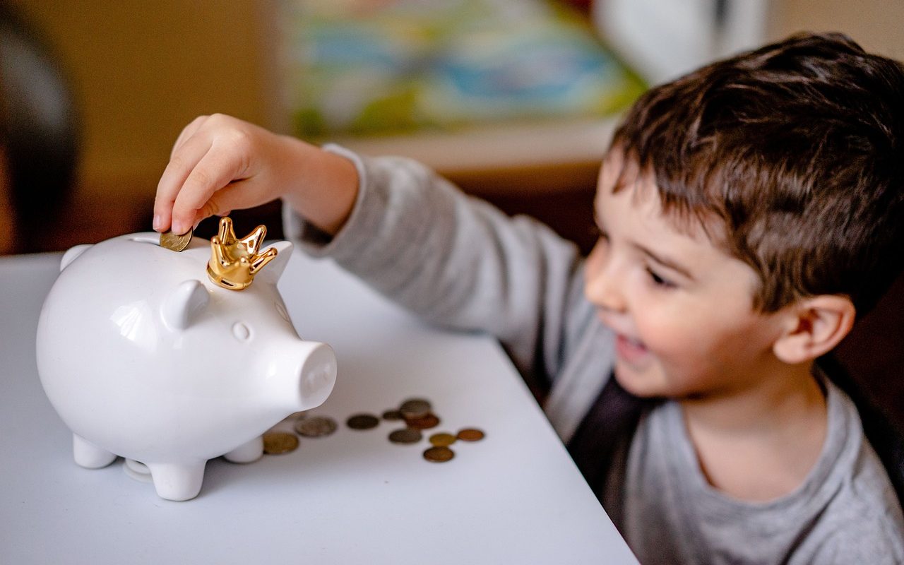 child piggy bank saving